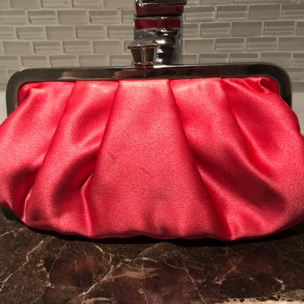 BCBG MaxAzria satin clutch pink
